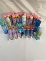 Full lot showing various shaving creams, gel, foam cans and razor cartridge pack with promotional offers.