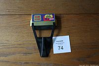 Front view of Nintendo NES Game Genie showing logo and connector.