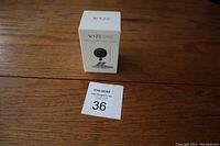 Front view of the unopened Wyze Cam box showing brand, model, and camera image.