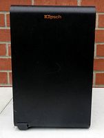 Front view of Klipsch RSB-14 subwoofer showing front speaker grill and top logo.
