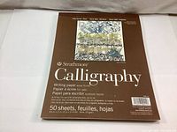 Front cover of Strathmore Calligraphy Writing Paper 400 Series pack displaying product name, details, and cover image.