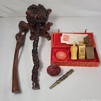 Overall view of carved hardwood pieces and seal stamp kit