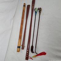 Top view of all 5 shoehorns laid out together.