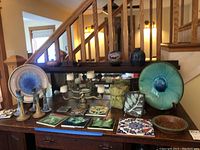 All items arranged on wooden table and shelf