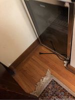 Full view of mini refrigerator with stainless steel door.