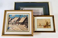Three framed works displayed together: small gilt-frame watercolour, mid-size textured winter scene, large green-matted print