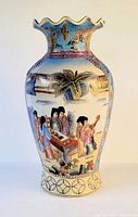 Front and center view of the large handpainted Satsuma style vase showing detailed Japanese figure scenes and palm tree landscape.