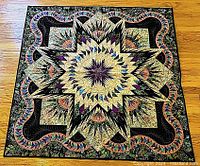 Full view of entire "Glacier Star" quilt laid flat