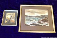 Two framed watercolors by Mary Hetherington placed on dark cloth, showing full lot.