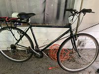 Full left side view of the Specialized Crossroads street bike showing frame, wheels, saddle, handlebars, and rear rack.