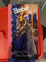 Closed box of the Barbie Secret of the Three Teardrops doll showing the front with artwork of the doll.