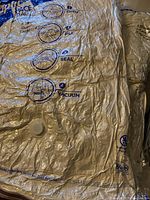 Photo of vacuum sealed bag with instructional print visible indicating how to use vacuum bags for duvets.
