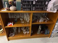 Front view of shelving unit with sample items to show full structure