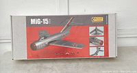 Box of Alpha Model MiG-15 scale model showing the aircraft and model number 012.