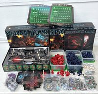 Full lot arranged showing two Space Hulk boxes, status displays, books, miniatures in tubs, tiles, tokens, dice, and timer