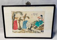 Framed painting depicting three women by banana trees, detailed view of entire framed artwork