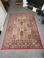 Top view of the IKEA Valby Ruta area rug laid flat on a floor showing full rug dimensions and design.