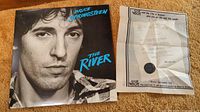 Bruce Springsteen 'The River' album cover and accompanying proclamation paper