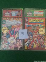 Front of both limited edition comic books, WildCats and Youngblood, with visible stickers mentioning limited edition and serial numbering.