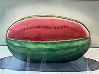Close-up of the watercolor painting showing a halved watermelon, emphasizing the detailed seed pattern and shading.
