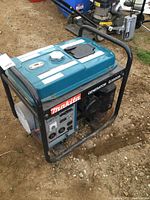 Front view of generator within tubular steel frame showing fuel tank, control panel and engine