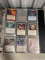Page showing nine Magic: The Gathering cards including Konda, Lord of Eiganjo and others.