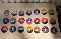 Overview of all GameCube discs arranged in grid on table
