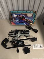 Overview of Power Glove set with box and accessories