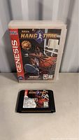 Photo showing Sega Genesis NBA Hangtime cartridge with damaged label and original game case with cover art.