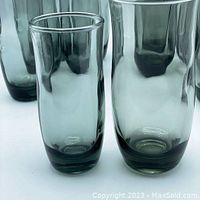 Close-up photo showing the smokey color and detail of the 1970s Anchor Hocking flair glasses.