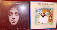 Photo showing front covers of 'Piano Man' by Billy Joel and 'Tea for the Tillerman' by Cat Stevens side by side.