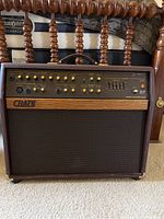 Front view of Crate CA-125D acoustic amplifier showing control panel and cabinet.