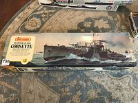 Top view of box artwork showing WWII naval corvette on sea with Matchbox logo and kit name.