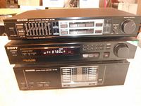 Front view of all three stereo components stacked: Kenwood KC-105 amplifier on top, Sony ST 5211 tuner in the middle, Kenwood KM-105 control model at bottom.