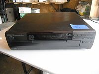 Full view of Kenwood 5 CD changer Model CD-203 showing front panel with buttons and disc tray