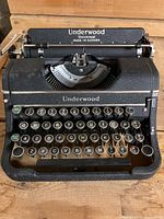 Full top view of vintage Underwood Universal manual typewriter showing keyboard and paper carriage.
