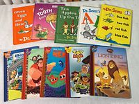 Lot of 10 books showing 5 Dr. Seuss titles in top row and 5 Disney Pixar movie books in bottom row.