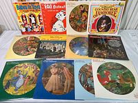 All 12 Disney albums arranged in three rows, showing both standard sleeves and picture discs