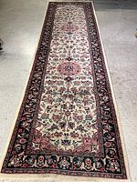 Full-length view of runner rug laid flat showing overall design and proportions