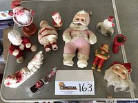 Overview of ten assorted vintage Santa and Christmas figures on tabletop