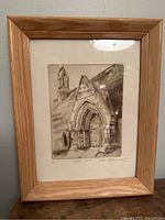 Framed pencil sketch of church entrance in Belfast dated 1868, showing detailed architectural elements.