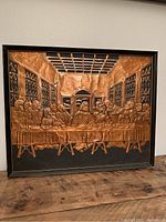 Front view of the framed copper relief wall art depicting The Last Supper scene.