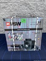 Closed box of PSW S5 5.1 HD Home Theater System showing brand and large image of subwoofer and speakers.