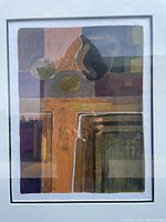 Close-up of the abstract print showing geometric shapes and muted colors double matted.