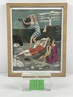 Framed print featuring three women at a beach with a lighthouse and sailboat in the background, shown fully in frame.