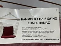 Photo of label showing hammock chair swing dimensions, material composition and weight limit