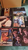 Six LPs: Rick Springfield, ABBA Arrival, Michael Jackson Thriller, England Dan & John Ford Coley, Cyndi Lauper, Loverboy