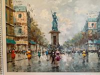 Close-up of central section showing statue and pedestrians