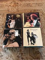 Photo of vinyl records including Donna Summer Live and More, Labelle Nightbirds, and Fleetwood Mac Rumours albums
