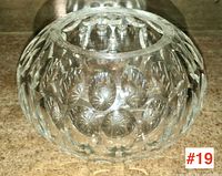 Top view image showing the detailed cut glass pattern on the rose bowl with circular and starburst facets.